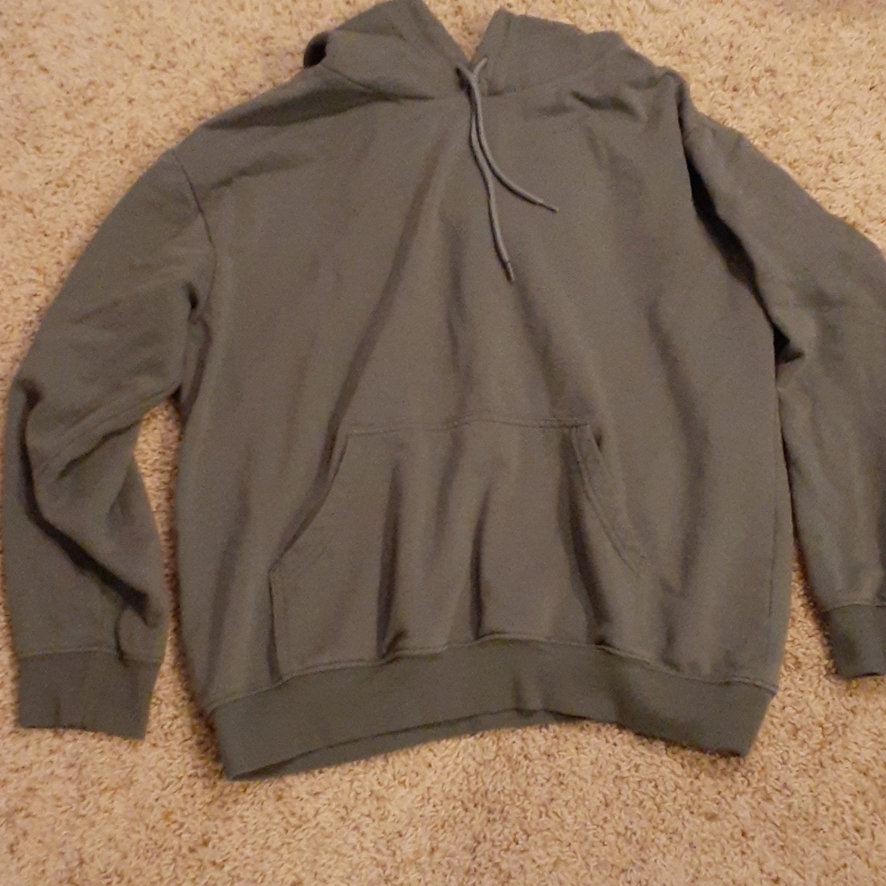 kind of oversized green H&M sweatshirt